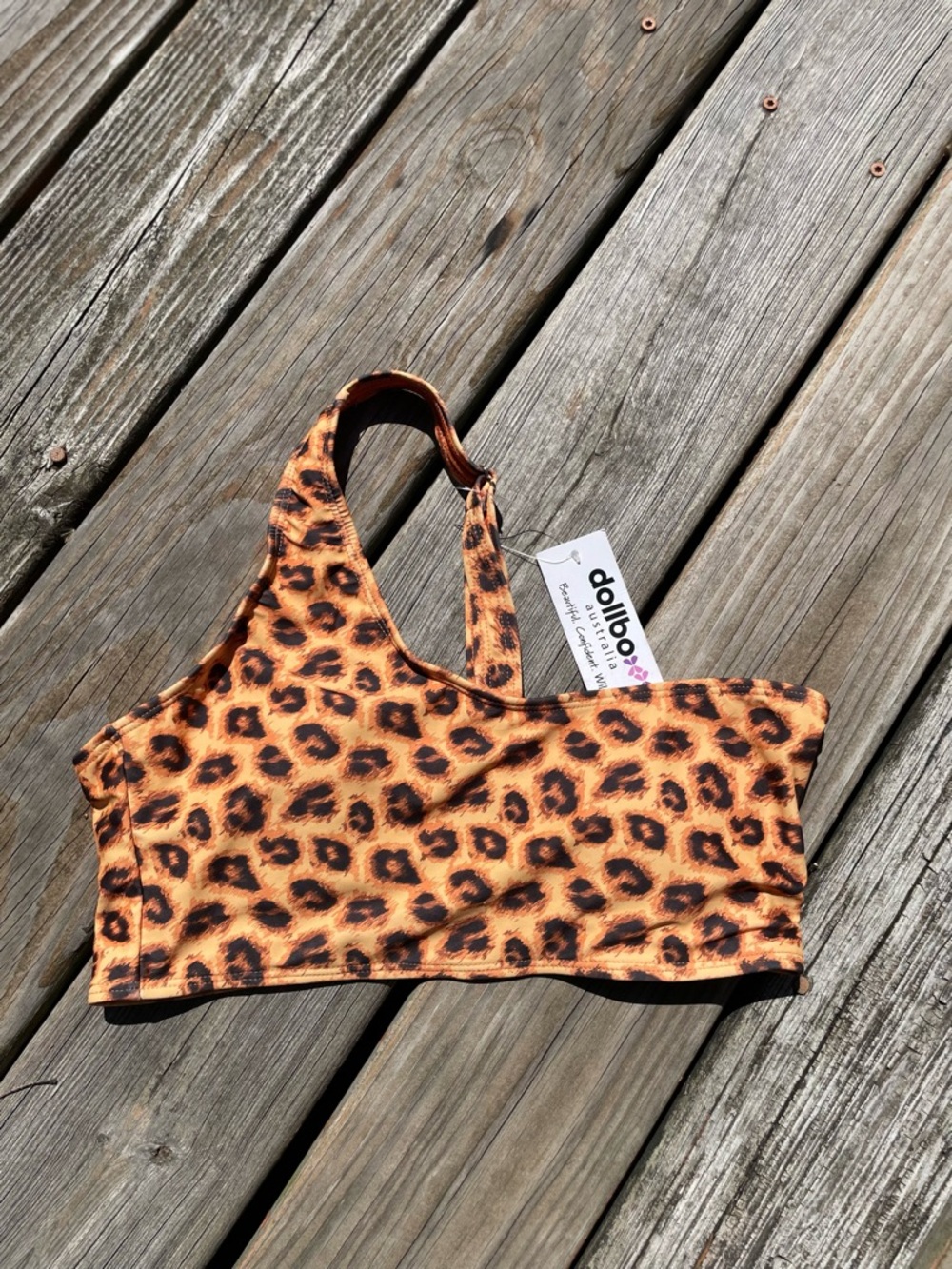 Dollhouse Orange and Brown Leopard Print One-Shoulder Sports Bra